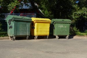 3 Dumpsters Waiting for an Electric Dumpster Mover