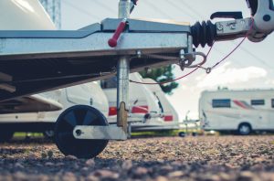 Image of a packed trailer yard in need of a motorized trailer dolly.